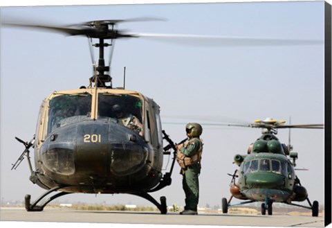 Framed Iraqi air force carries wounded warrior on aeromedical evacuation mission Print