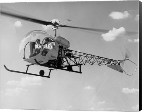 Framed Low angle view of two people sitting in a helicopter, Bell 47G-2 Print