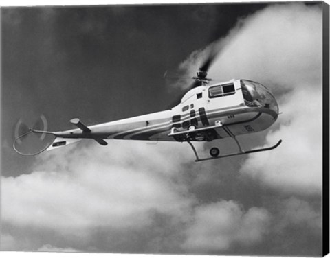 Framed Low angle view of a helicopter in flight in the sky, Bell Helicopter Print