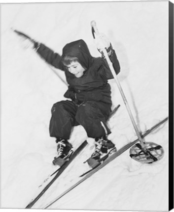 Framed Boy skiing on snow Print