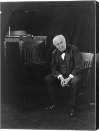 Framed Thomas Edison, seated beside phonograph Print