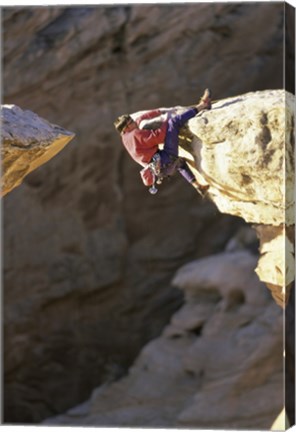 Framed High Angle View of a Man hanging off of a Summit Print