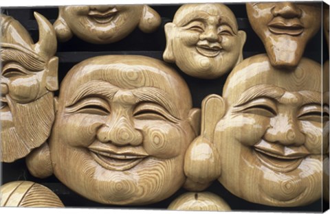 Framed Close-up of Faces of Laughing Buddha, Vietnam Print