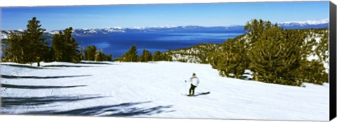 Framed Tourist skiing in a ski resort, Heavenly Mountain Resort, Lake Tahoe, California-Nevada Border, USA Print