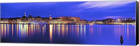 Framed Buildings at the waterfront lit up at dusk, Stockholm, Sweden Print