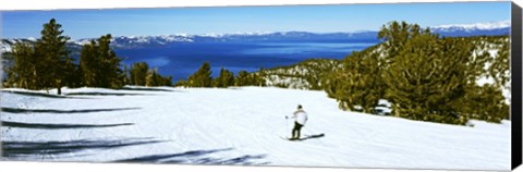 Framed Tourist skiing in a ski resort, Heavenly Mountain Resort, Lake Tahoe, California-Nevada Border, USA Print