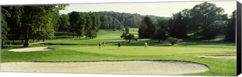 Framed Four people playing on a golf course, Baltimore County, Maryland, USA Print