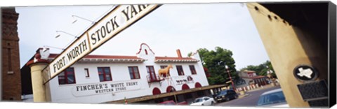 Framed Low angle view of a commercial signboard, Fort Worth Stockyards, Fort Worth, Texas, USA Print