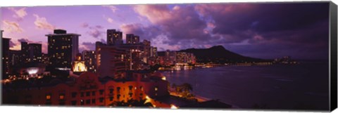 Framed Buildings lit up at dusk, Waikiki, Oahu, Hawaii, USA Print