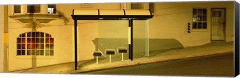 Framed USA, California, San Francisco, Bus stop at night Print