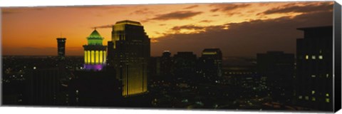 Framed High angle view of buildings lit up at dusk, New Orleans, Louisiana, USA Print