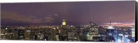 Framed Buildings in a city lit up at dusk, Midtown Manhattan, Manhattan, New York City, New York State, USA Print