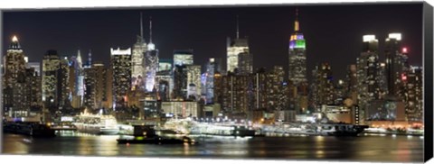 Framed Buildings in a city lit up at night, Hudson River, Midtown Manhattan, Manhattan, New York City, New York State, USA Print