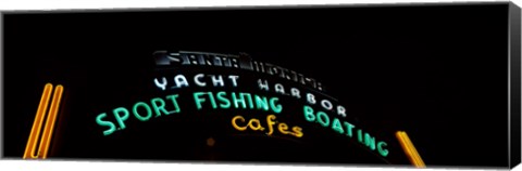 Framed Low angle view of a neon signboard, Santa Monica Pier, Santa Monica, Los Angeles County, California, USA Print