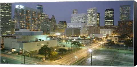 Framed Skyscrapers lit up at night, Houston, Texas Print