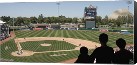 Framed Spectator watching a baseball match at stadium, Raley Field, West Sacramento, Yolo County, California, USA Print