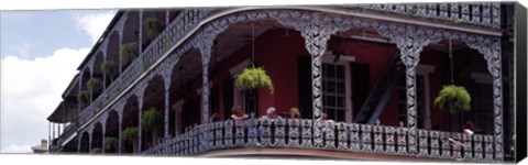 Framed People sitting in a balcony, French Quarter, New Orleans, Louisiana, USA Print