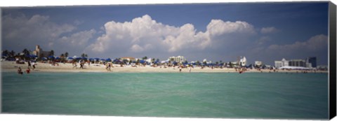 Framed Tourists on the beach, Miami, Florida, USA Print