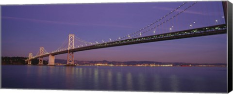 Framed Low angle view of a bridge at dusk, Oakland Bay Bridge, San Francisco, California, USA Print