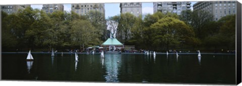 Framed Toy boats floating on water, Central Park, Manhattan Print