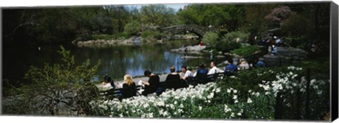 Framed Group of people sitting on benches near a pond, Central Park, Manhattan, New York City, New York State, USA Print