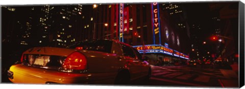 Framed Car on a road, Radio City Music Hall, Rockefeller Center, Manhattan, New York City, New York State, USA Print