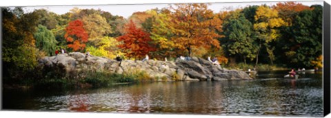 Framed Group of people sitting on rocks, Central Park, Manhattan, New York City, New York, USA Print