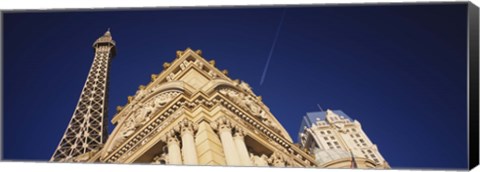 Framed Low angle view of a building in front of a replica of the Eiffel Tower, Paris Hotel, Las Vegas, Nevada, USA Print