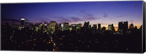 Framed Skyscrapers in a city lit up at night, Manhattan, New York City, New York State, USA Print