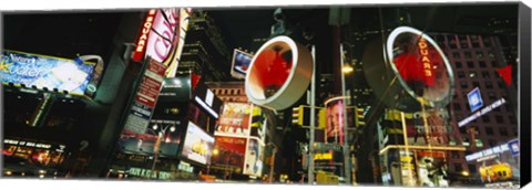 Framed Low angle view of buildings lit up at night, Times Square, Manhattan, New York City, New York State, USA Print