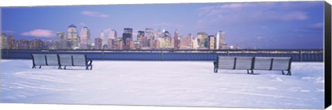 Framed Park benches in snow with a city in the background, Lower Manhattan, Manhattan, New York City, New York State, USA Print