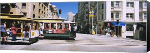 Framed Two cable cars on a road, Downtown, San Francisco, California, USA Print
