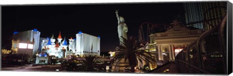 Framed Statue in front of a hotel, New York New York Hotel, Excalibur Hotel And Casino, The Las Vegas Strip, Las Vegas, Nevada, USA Print