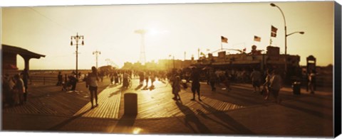 Framed Tourists walking on a boardwalk, Coney Island Boardwalk, Coney Island, Brooklyn, New York City, New York State, USA Print