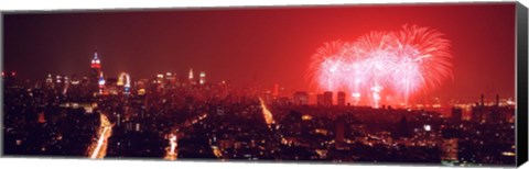 Framed Fireworks display at night over a city, New York City, New York State, USA Print