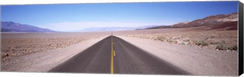 Framed USA, California, Death Valley, Empty highway in the valley Print