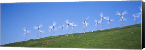 Framed Low angle view of wind turbines on a hill, Altamont Pass, California, USA Print