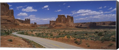 Framed Empty road running through a national park, Arches National Park, Utah, USA Print