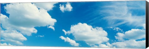 Framed Clouds against a pale blue sky Print