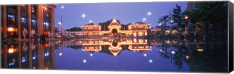 Framed Buildings in an amusement park lit up at dusk, Tivoli Gardens, Copenhagen, Denmark Print