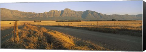 Framed Road running through a farm, South Africa Print