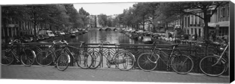 Framed Bicycle Leaning Against A Metal Railing On A Bridge, Amsterdam, Netherlands Print