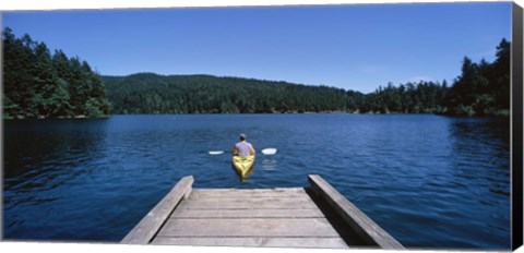 Framed Rear view of a man on a kayak in a river, Orcas Island, Washington State, USA Print