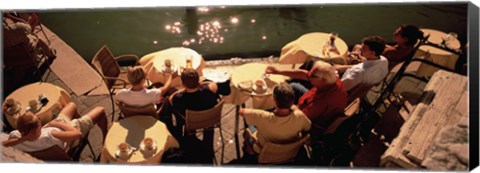 Framed High angle view of tourists sitting along a canal, Venice, Italy Print