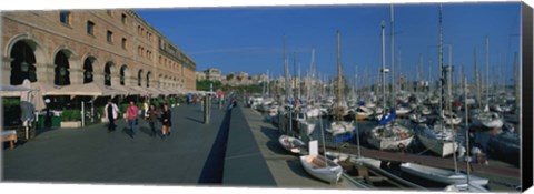 Framed Pedestrian walkway along a harbor, Barcelona, Catalonia, Spain Print