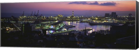 Framed High angle view of city at a port lit up at dusk, Genoa, Liguria, Italy Print