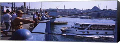 Framed Side profile of fishermen fishing in a river, Galata Bridge, Istanbul, Turkey Print