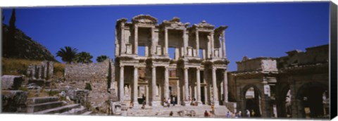 Framed Tourists in front of the old ruins of a library, Library At Epheses, Ephesus, Turkey Print