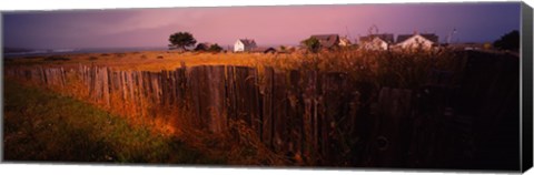 Framed Wooden fence in a field with houses in the background, Mendocino, California, USA Print