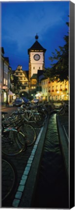 Framed Bicycles parked along a stream near a road, Freiburg, Baden-Wurttemberg, Germany Print